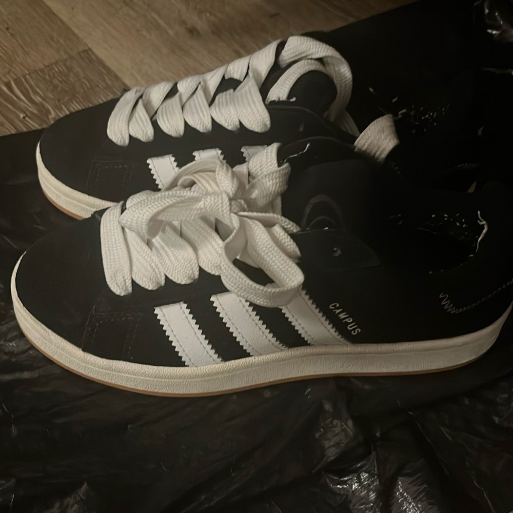 Womens 7 1/2 Black Adidas Campus shoes.